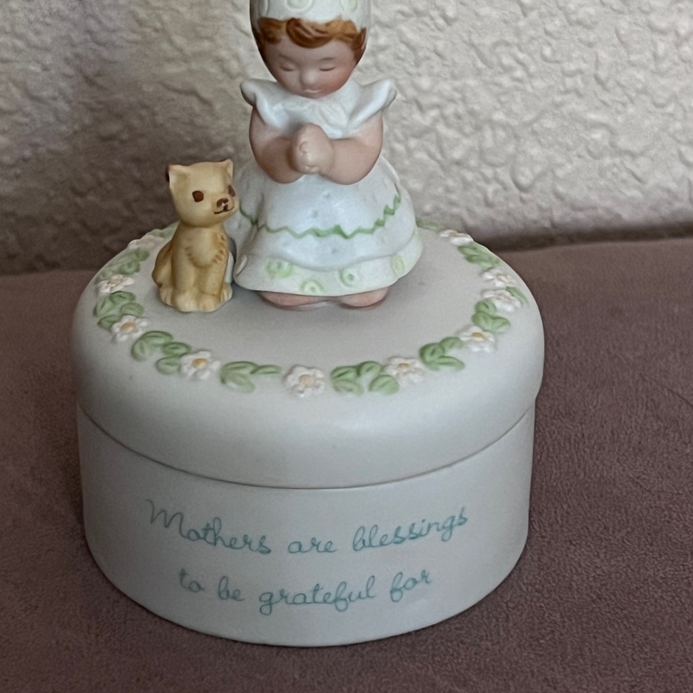 Ceramic Figurine with Cat and Floral Design